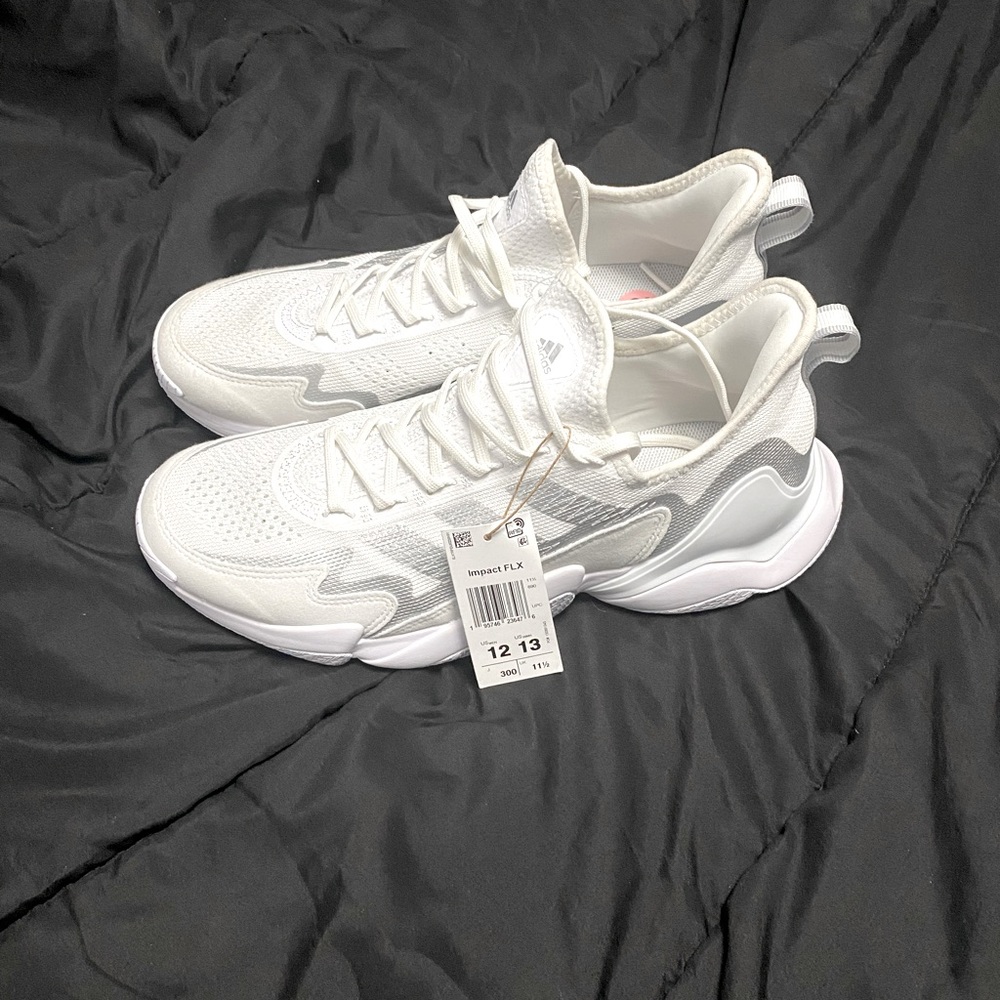 White and grey adidas impact FLX shoes